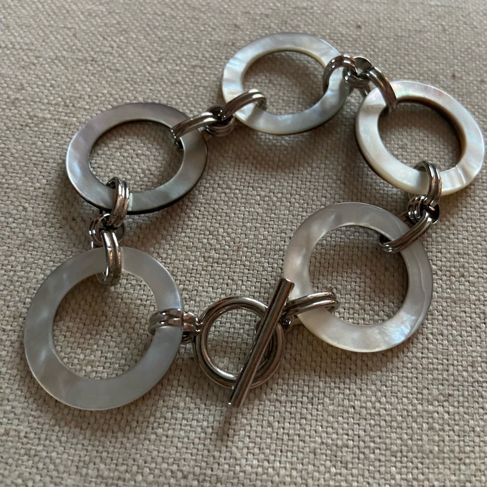 Elegant Silver and Cream Bracelet